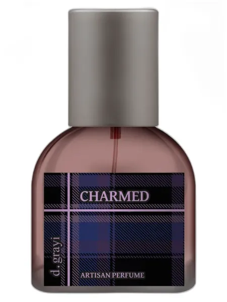 Frasco del perfume d.grayi Charmed d.grayi unisex