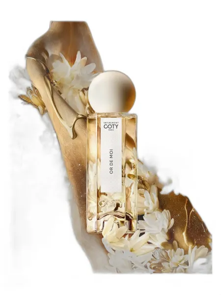 Frasco del perfume Infiniment Coty Paris Or de Moi unisex
