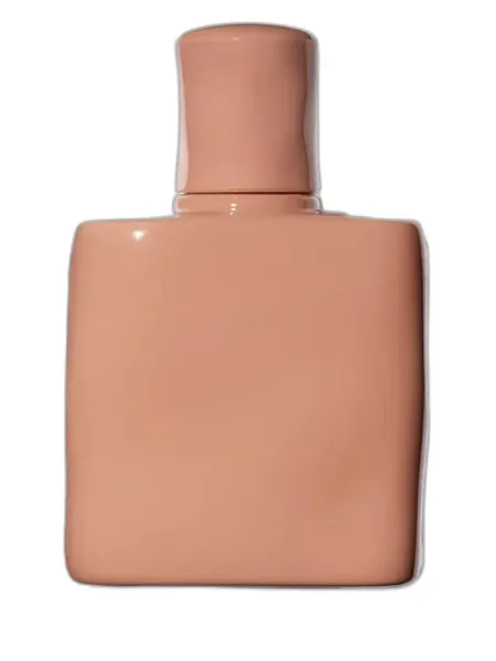 Frasco del perfume KKW Fragrance Nude Soleil