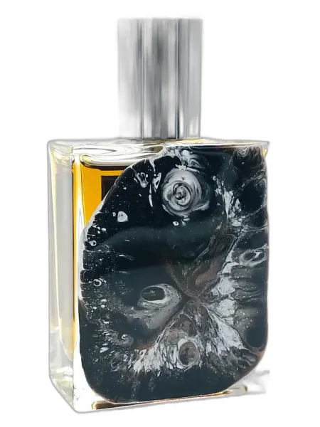 Frasco del perfume Nimere Parfums Nomads unisex Eau de Parfum
